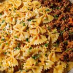 Cheesy Bowtie Pasta with Savory Cajun Ground Beef in Garlic Cream