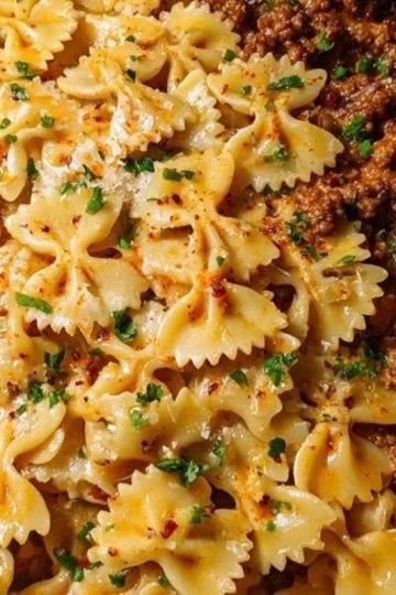 Cheesy Bowtie Pasta with Savory Cajun Ground Beef in Garlic Cream