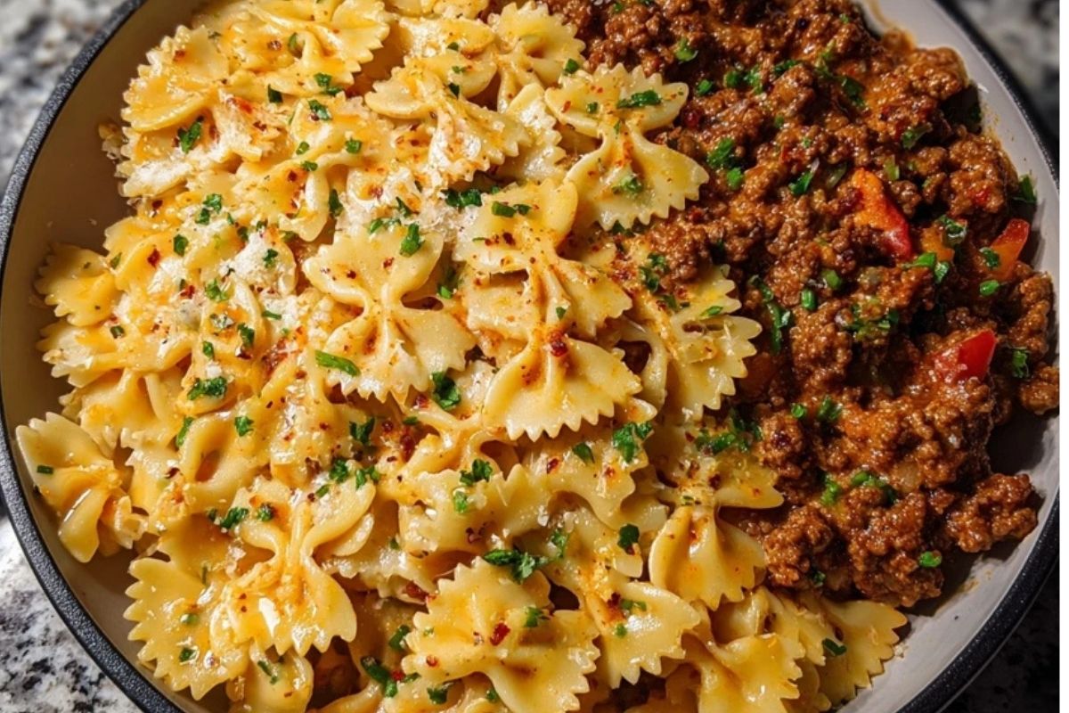Cheesy Bowtie Pasta with Savory Cajun Ground Beef in Garlic Cream