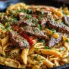 Creamy Cajun Butter Tender Steak Pasta Skillet