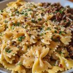 Cheesy Bowtie Pasta with Savory Cajun Ground Beef in Garlic Cream