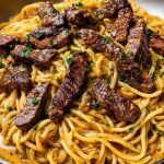 Creamy Cajun Garlic Butter Spaghetti with Beef Strips