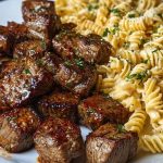 Garlic Butter Steak Bites with Spicy Cajun Alfredo Twisted Pasta