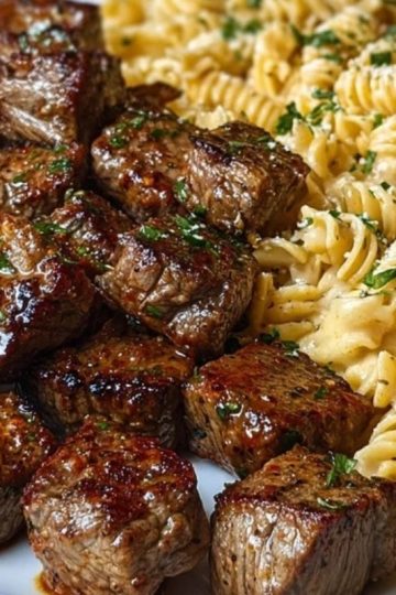 Garlic Butter Steak Bites with Spicy Cajun Alfredo Twisted Pasta