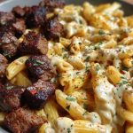 Penne with Creamy Velveeta Four-Cheese and Cajun Beef Bites