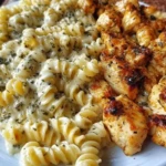 Cheesy Alfredo Twisted Pasta with Golden Garlic Butter Chicken in Creamy Sauce 1