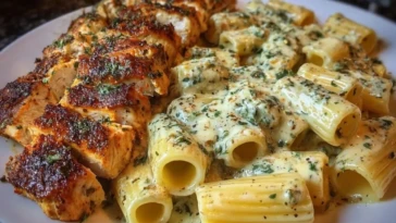 Rigatoni in Cheesy Italian Herb Alfredo with Cajun Chicken 1